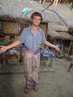 Me in the back of a truck hitchhiking in Indonesia