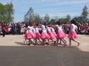 Girls in pink skirts dancing