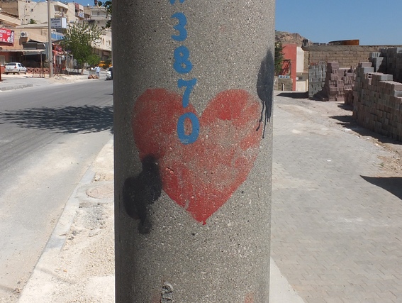 Heart and arrow on a street post in Mardin