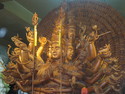 Many headed wooden statue