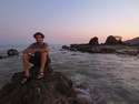 Me on rocks at beach during sunset