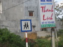 The strut inferred by the man's long gate and the position of his cane which indicates that it's simply a stylish affectation and the woman's handbag which implies that they're not mountain climbers in the middle of a trek can only lead to the conclusion that this is a pimp crossing sign.