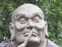 Statue picking his nose