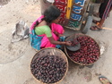 Woman selling waterchestnuts